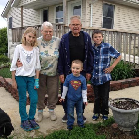 Cheyanne (far-left) and Alexander (far-right) with their grandparents and brother.